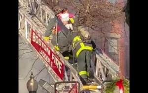 firefighters rescue woman, two children from burning building