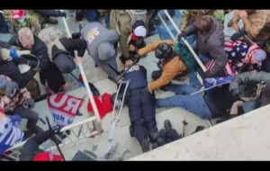 Pro-Trump rioters beat and stomped DC police officer with American flag pole