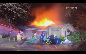 Firefighter's helmet camera shows father, daughter rescued from burning home