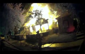 Helmet Cam Of Firefighters Fighting Large House Fire